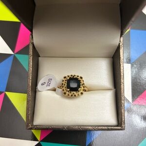 Elegant Gold and Black Ring